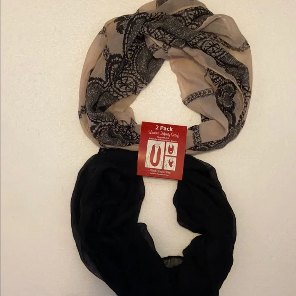 NWT  2 pack infinity scarves 1 solid black 1 cream and black with design